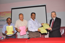 SKU VC Prof.Kuderu Rajagopal exchanging MoU with Italian professor for students exchange program
